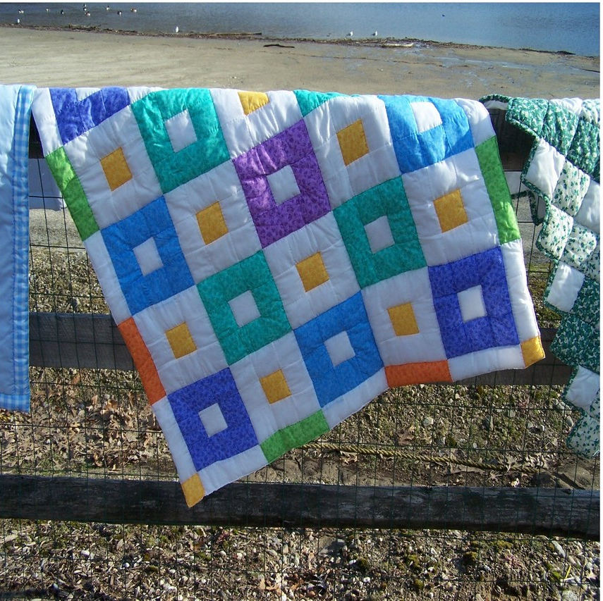 bright patchwork baby quilt